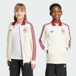 Chaqueta de niño de la segunda equipación de España. Ropa oficial de la Selección Española de fútbol para la afición infantil.