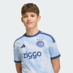 Tercera equipación para niños del Ajax Amsterdam temporada 26/27. Camiseta de fútbol oficial para los más pequeños aficionados.