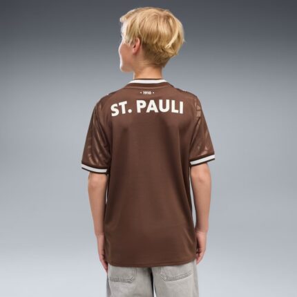 Camiseta de fútbol para niño del St. Pauli, primera equipación de la temporada 26/27. Producto oficial para pequeños fans.