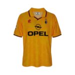 Camiseta retro AC Milan 1995/96 tercera equipación amarilla — vista frontal en maniquí