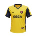 Camiseta retro Arsenal 2000/01 segunda equipación amarilla y azul — vista frontal en maniquí