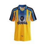 Camiseta retro del Chelsea FC de la temporada 1995-96, segunda equipación en amarillo y azul. — vista frontal en maniquí