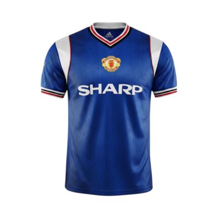 Camiseta retro Manchester United 1985-86 tercera equipación azul — vista frontal en maniquí