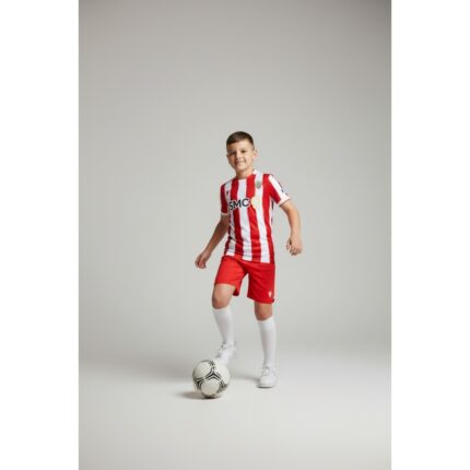 Primera equipación oficial de la UD Almería para niño de la temporada 2026/27. Camiseta y pantalón rojiblancos.
